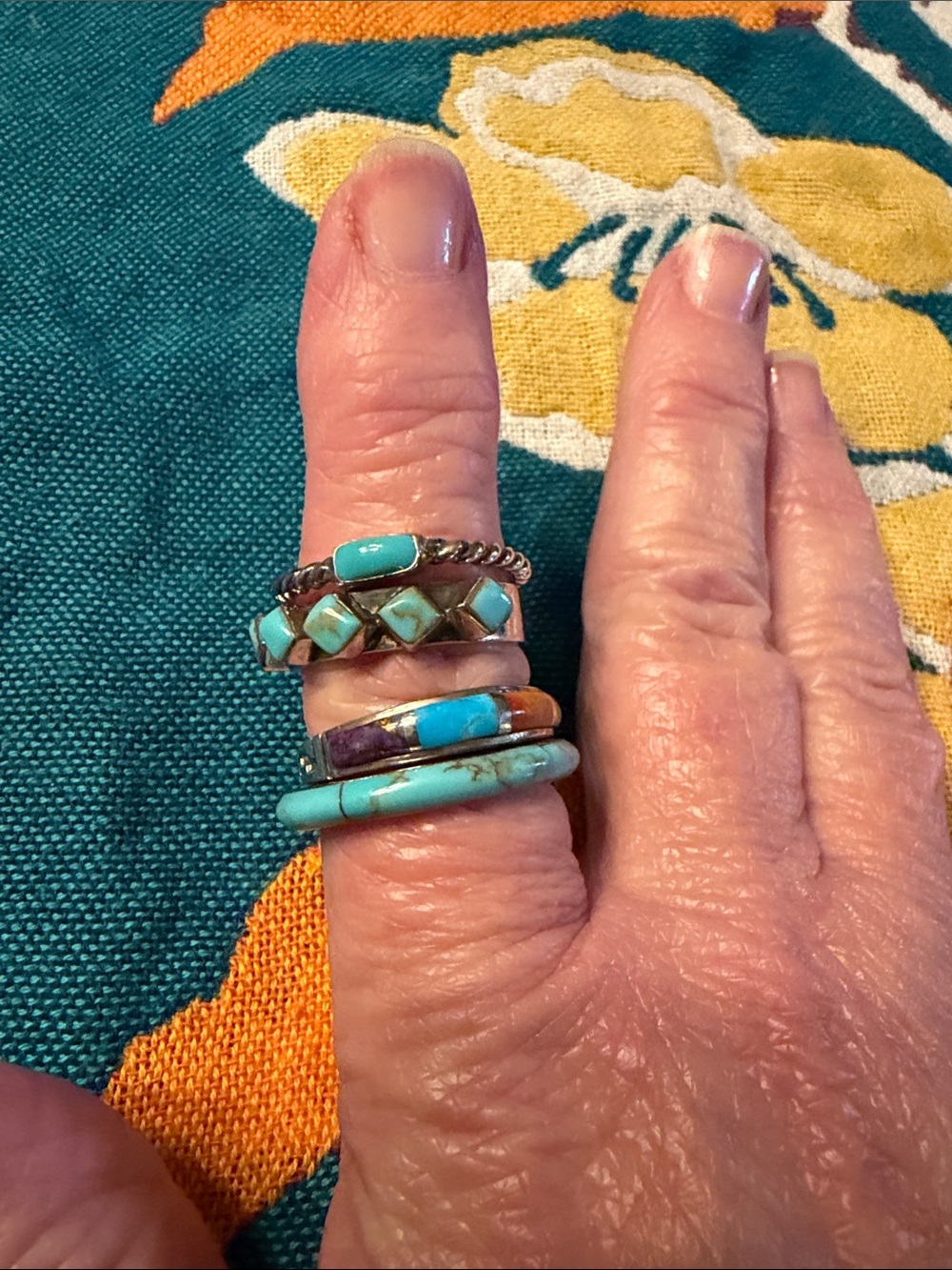 Four turquoise rings of different sizes